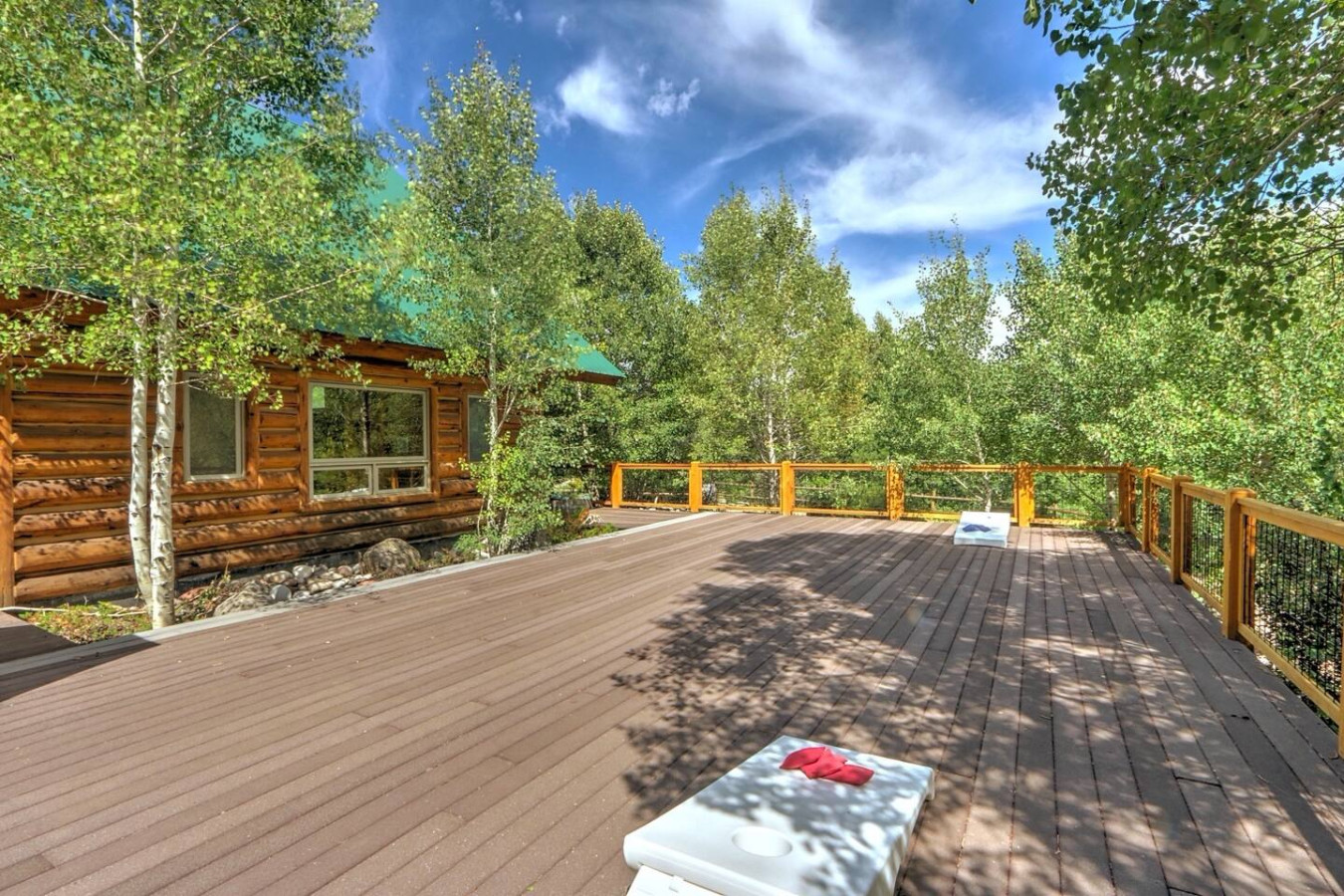 Bean bag toss game on spacious deck