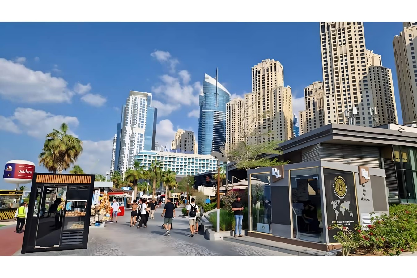 Vibrant Dubai Stroll: Explore buzzing walkways with stunning skyline views just steps away!