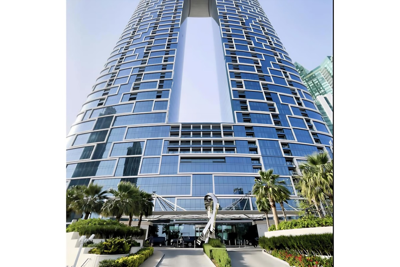 Exterior: Experience luxury living in this stunning architectural masterpiece with lush greenery!