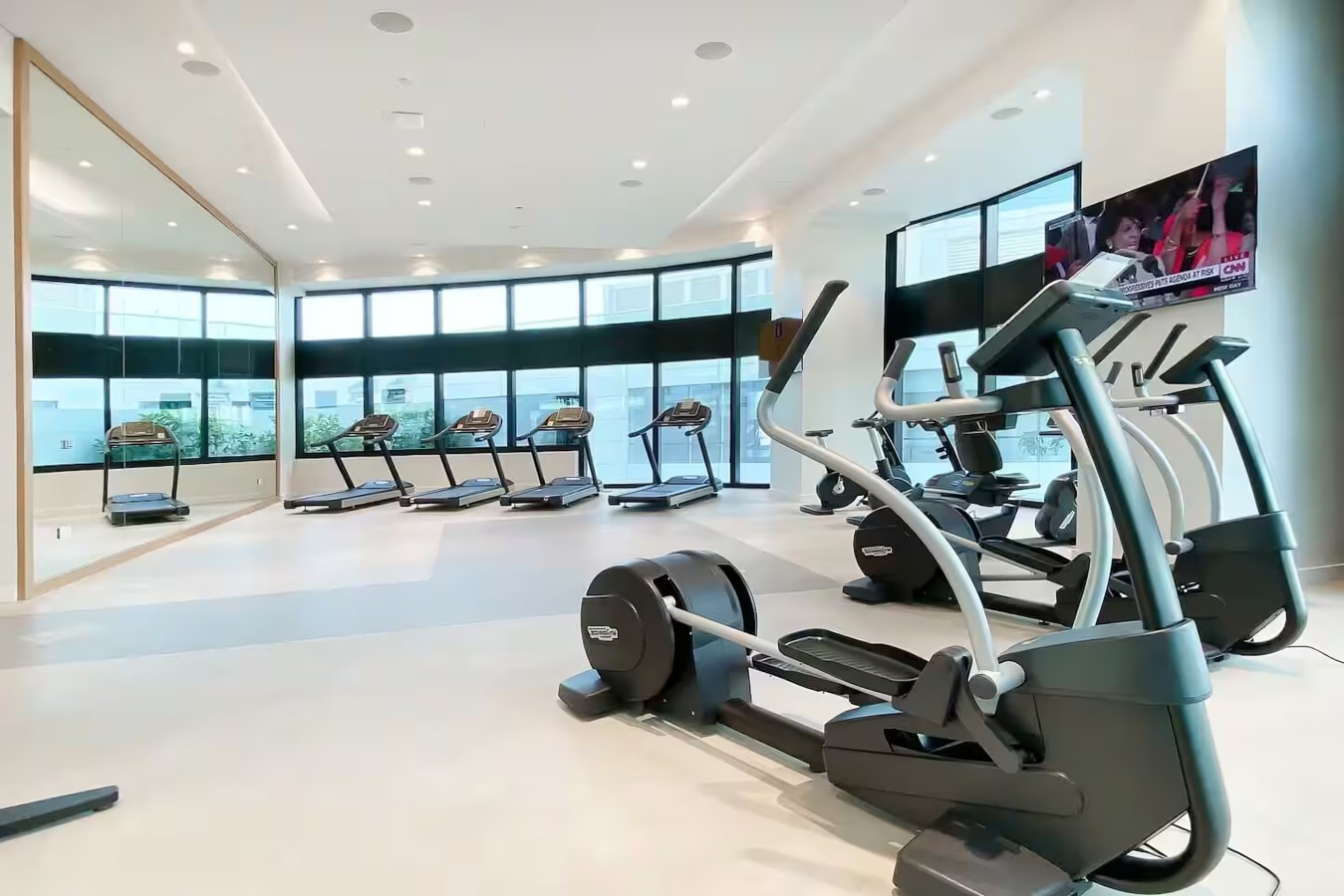 Fitness Center: Stay active in our bright, modern gym with stunning views and top-notch equipment!