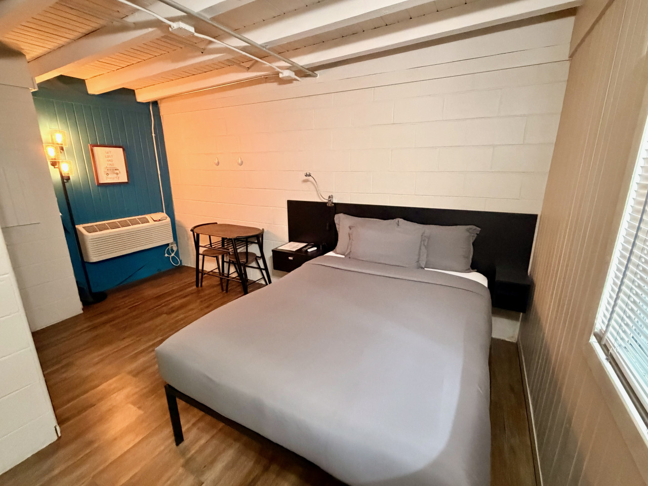 The Traveler's Den — themed room at The Cedar