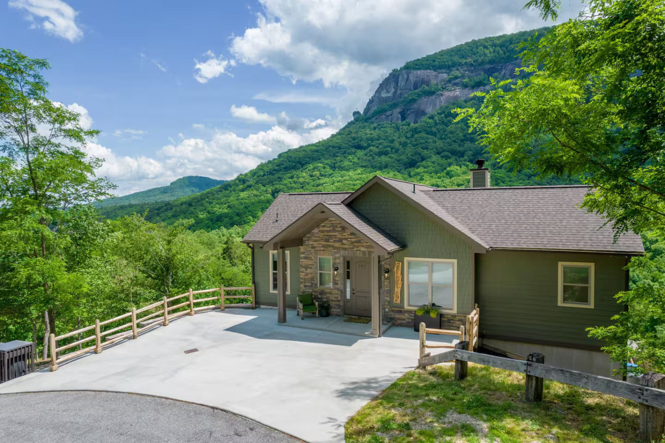 Stunning modern mountain home nestled in lush forested hills with dramatic rock cliffs. Wake up to panoramic views, enjoy fresh air from your private deck. Modern amenities meet natural beauty perfectly.