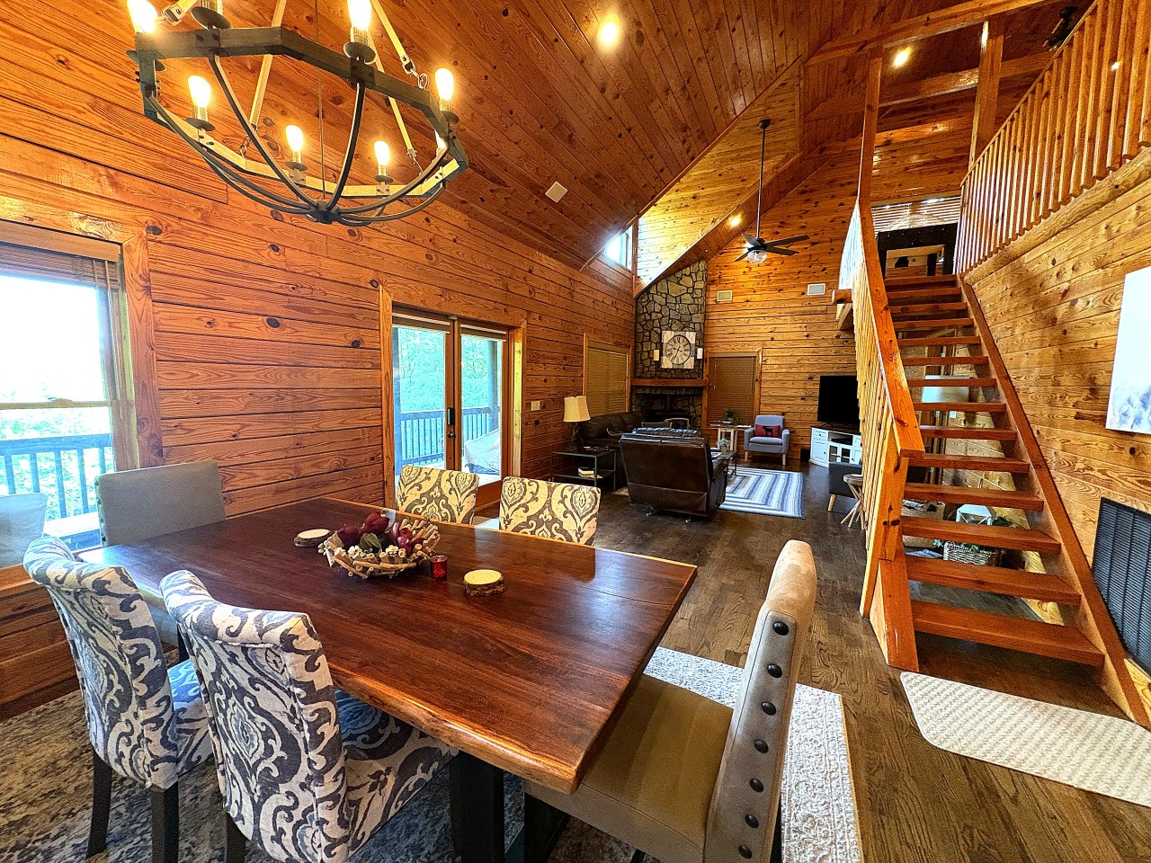 Open dining and living area inside the log cabin at Mount Airy, NC