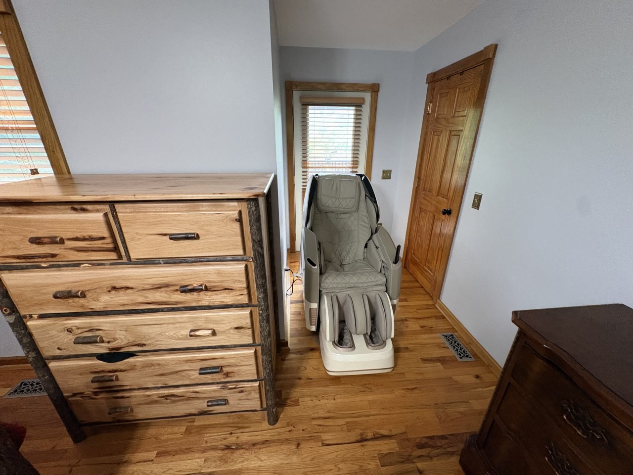 Primary bedroom with a massage chair.jpg