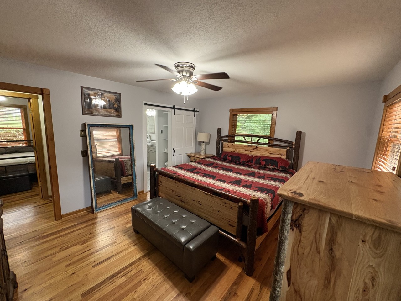 Primary bedroom, king log bed.jpg