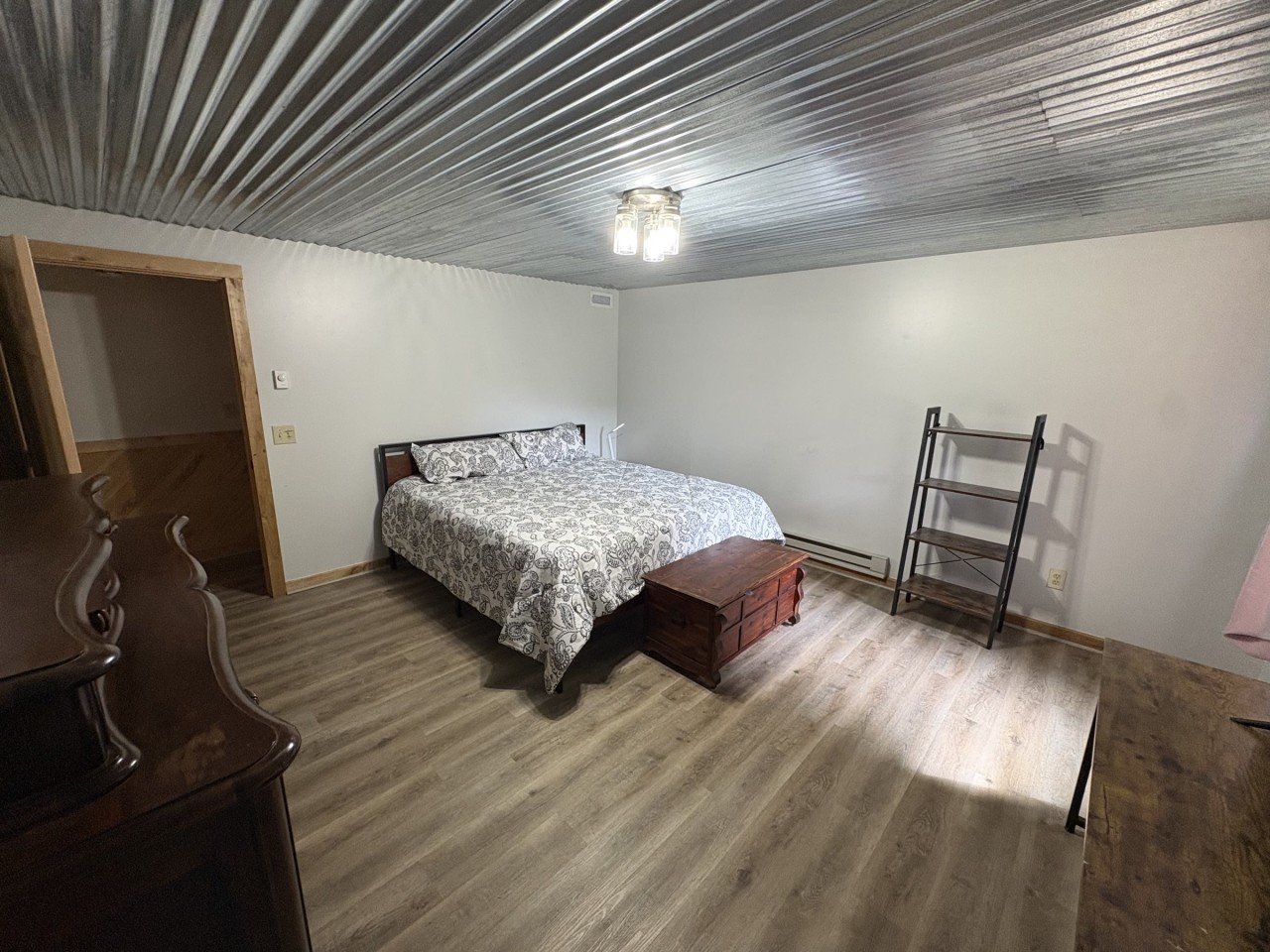 Lower-level bedroom, room to spread out.jpg