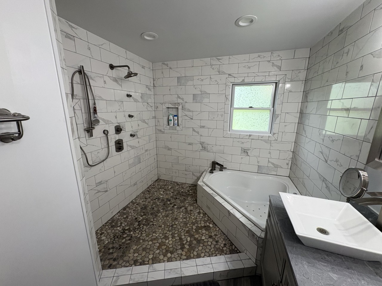 En suite bath with a jetted tub.jpg