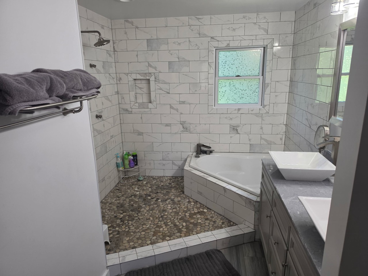 En suite with a jetted tub and walk-in shower.jpg