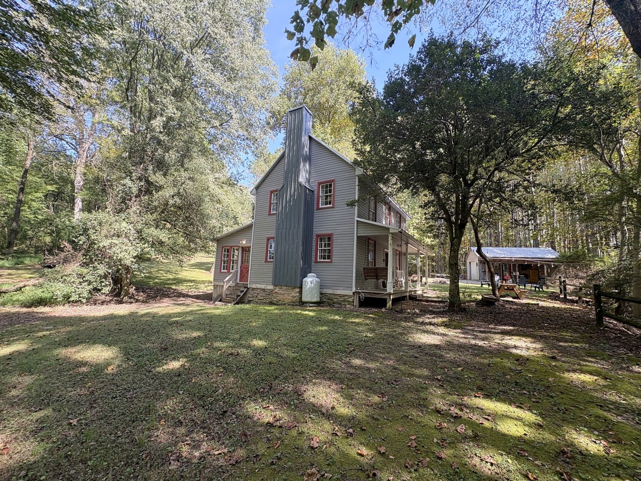 Farmhouse on 14 wooded acres.jpg