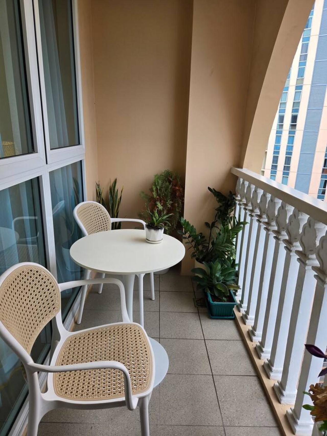 From the balcony, one can enjoy a breathtaking view of the city skyline.