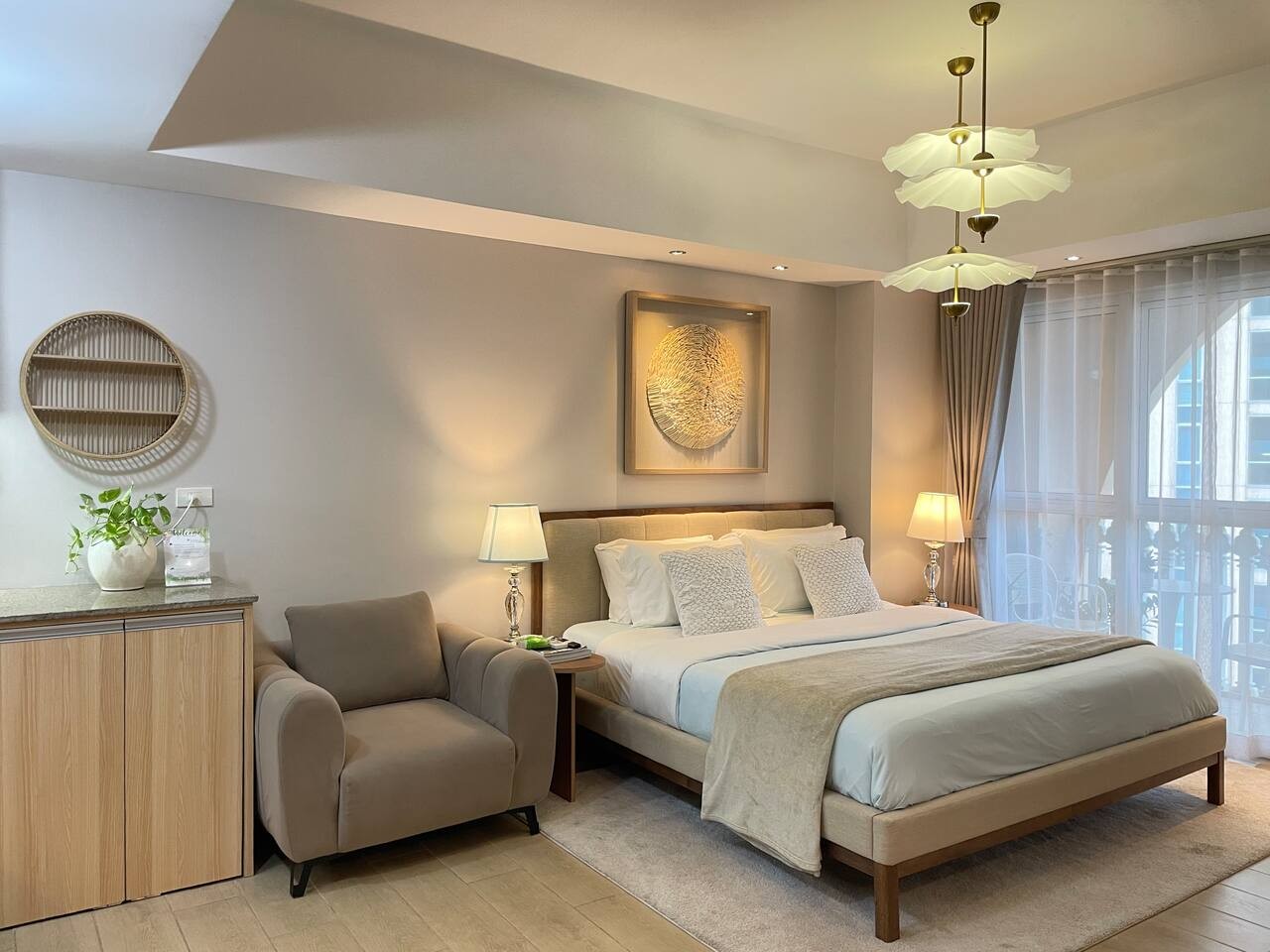 A spacious studio apartment with 2 seaters sofa, a charming balcony, measuring 41 square meters. This place is super cozy, with a comfy bed, soft linens, and pillows that just beckon you to unwind and recharge after a long day!