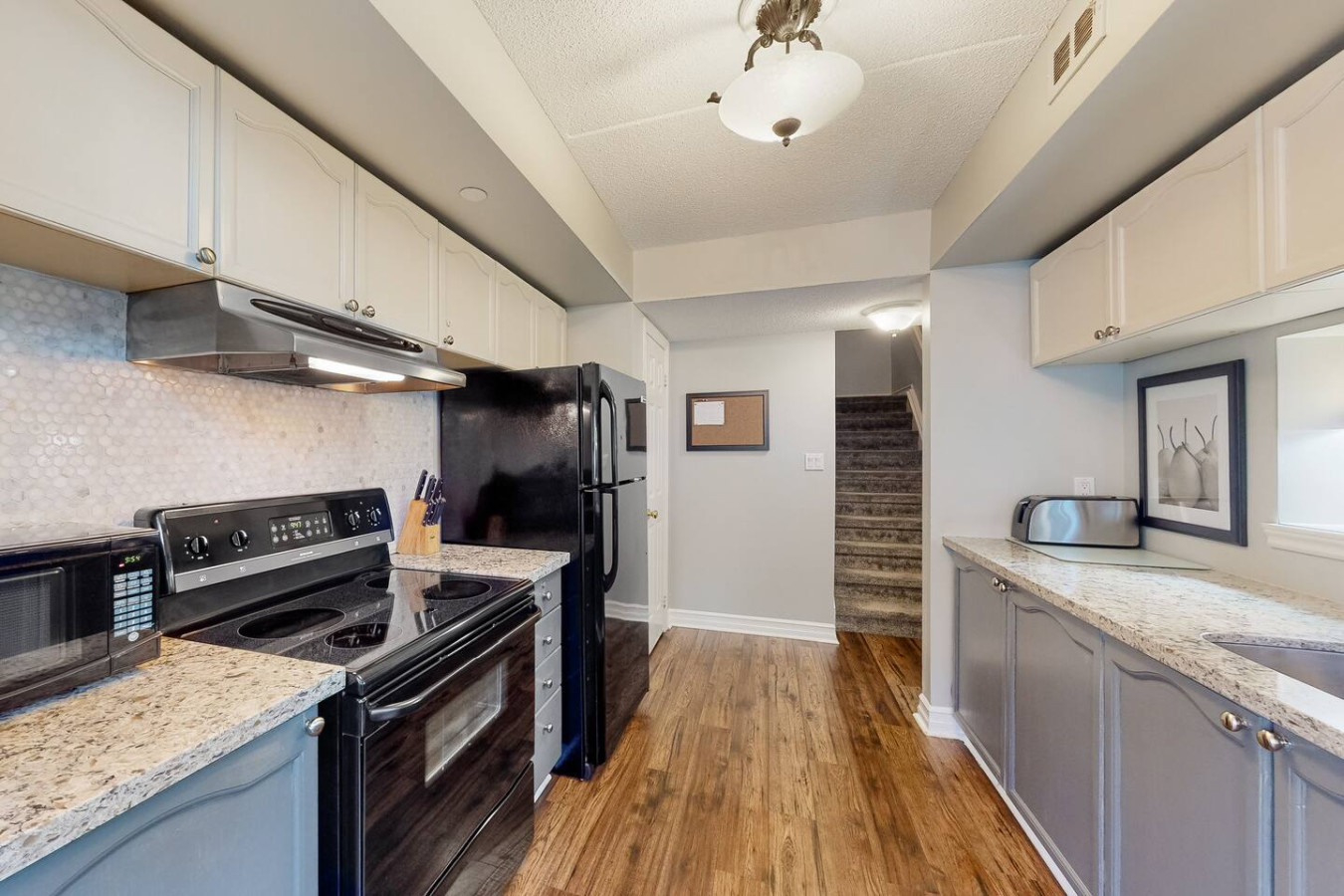 Spacious Family Home | Steps to BM Village & Golf | Photo 8