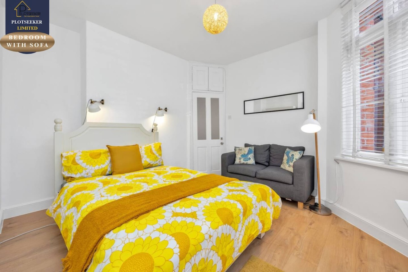 BEDROOM WITH SOFA