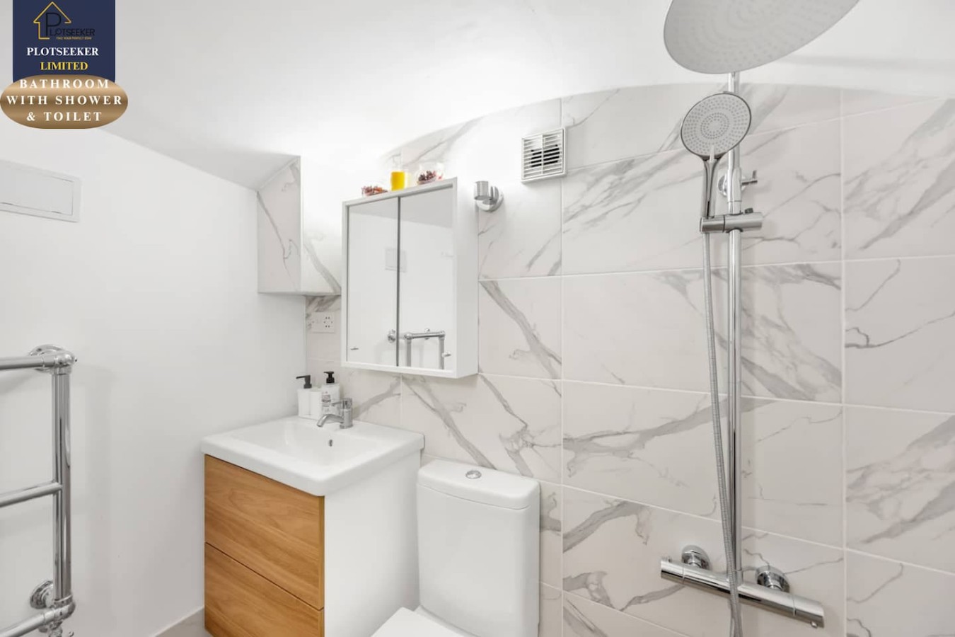 BATHROOM WITH SHOWER, TOILET AND ESSENTIALS