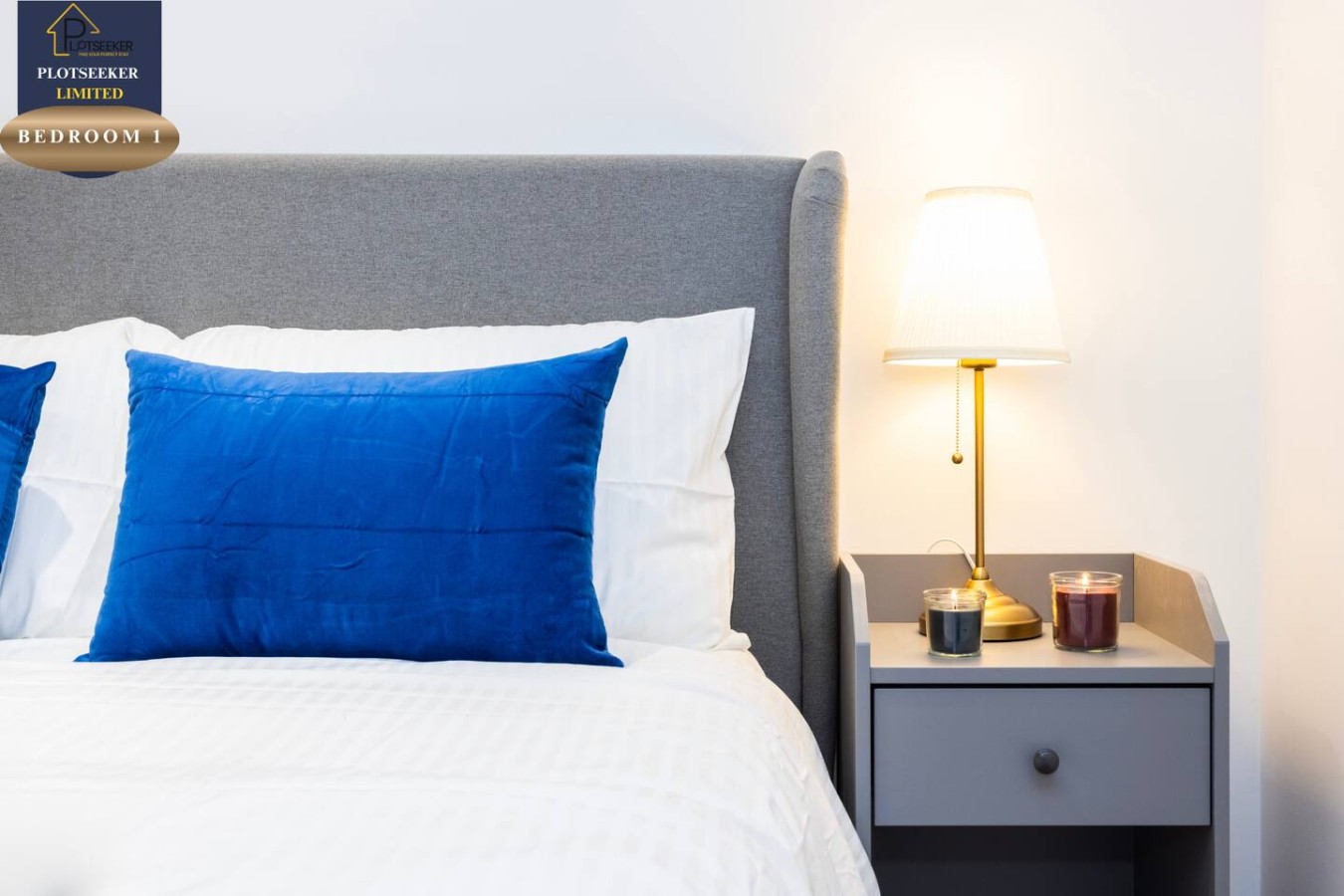 BED WITH SIDE TABLES AND LAMPS