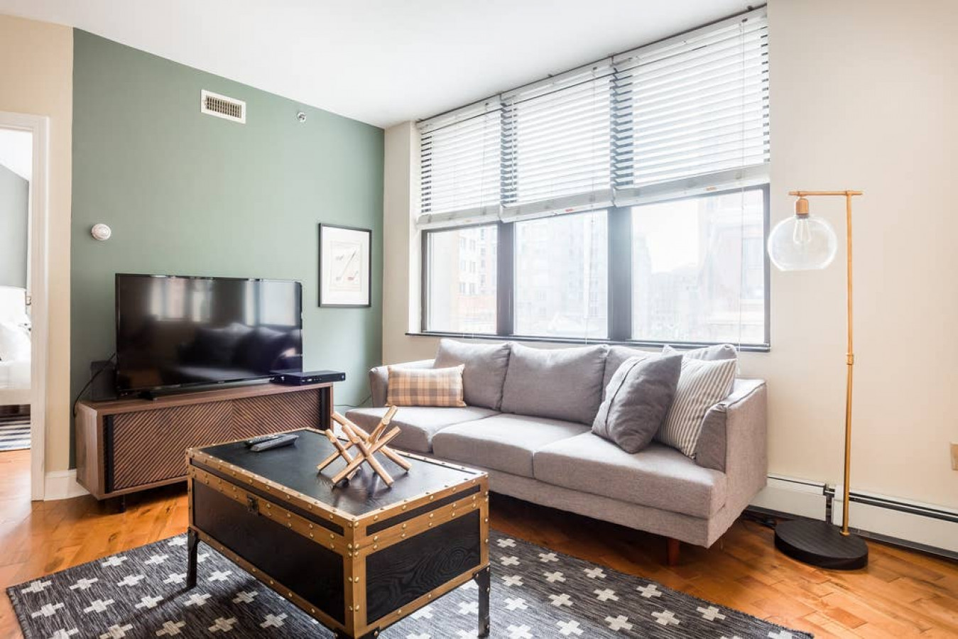 Newly refinished hardwood floors, cable tv and internet.  Living room has additional seating area.