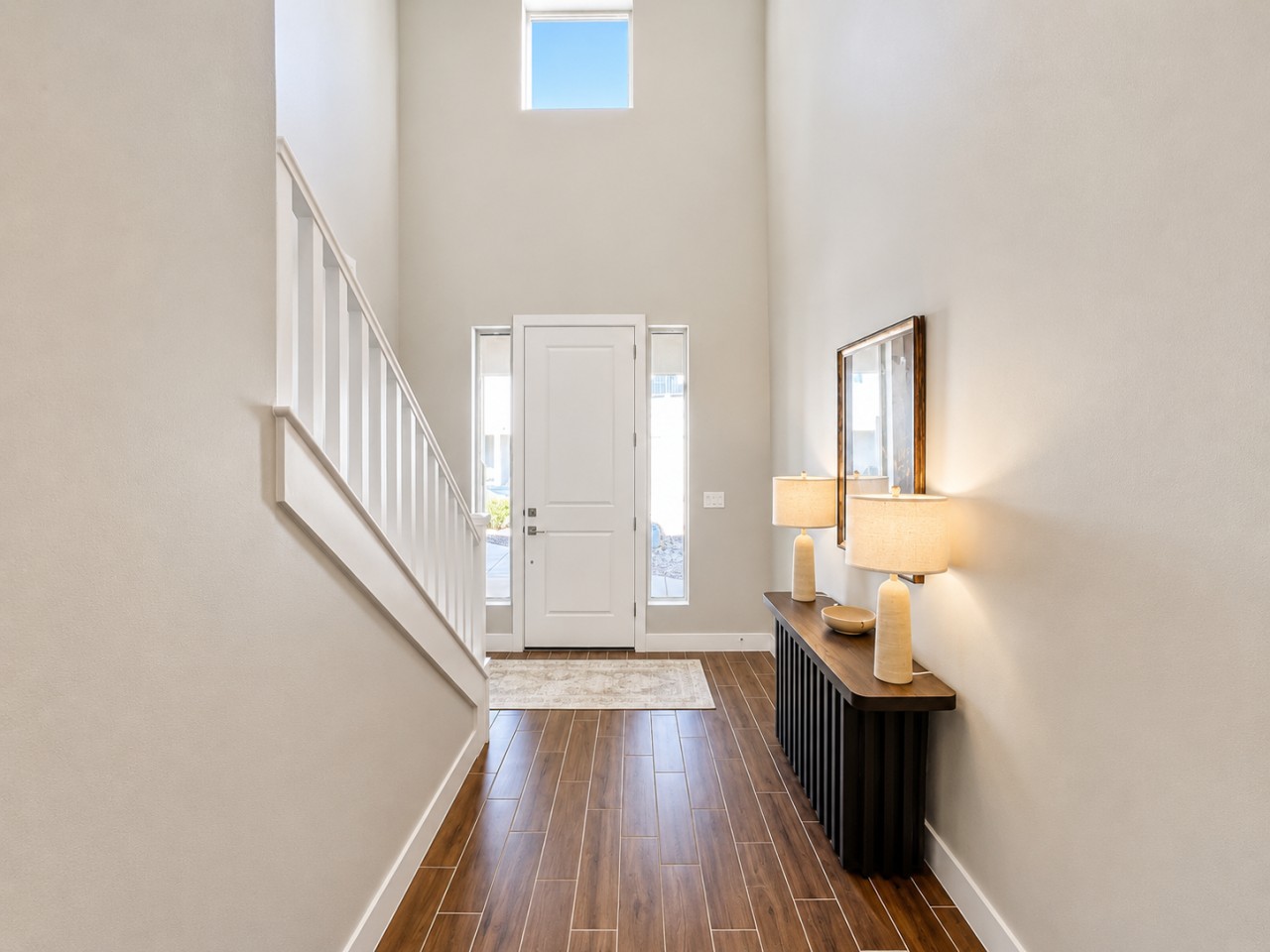 Beautiful and Airy Entryway with Staircase