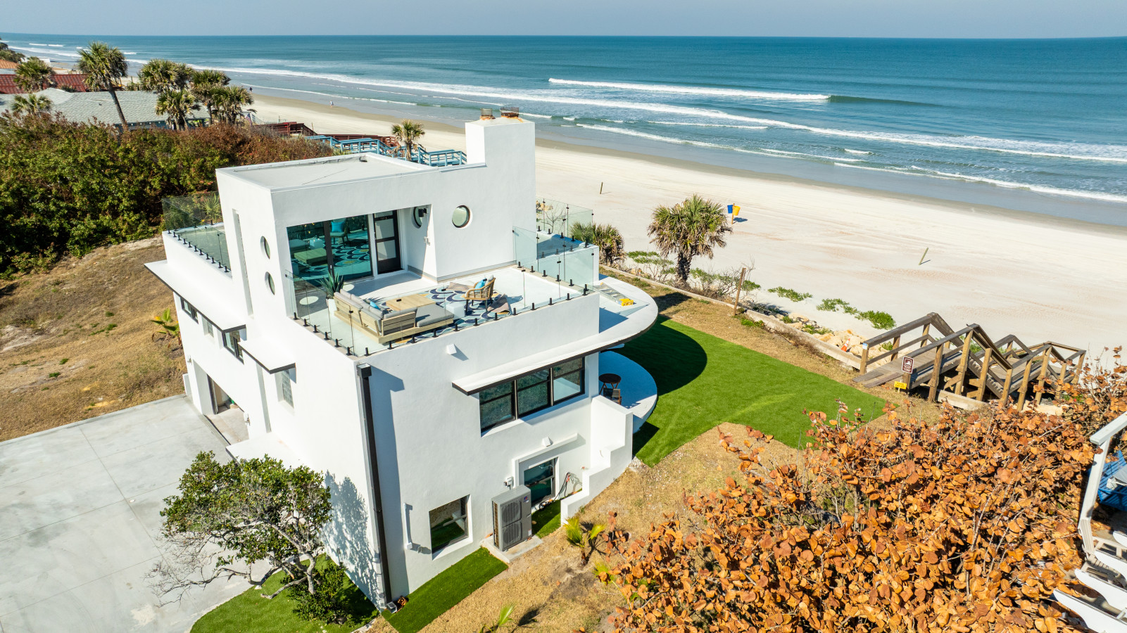 Jewel of the Shores Oceanfront Estate | Rooftop Lounge | Game Room