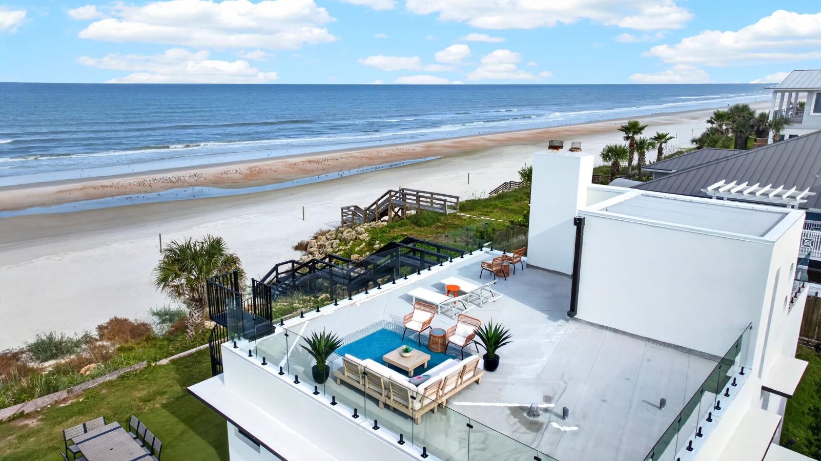 Jewel of the Shores Oceanfront Estate | Rooftop Lounge | Game Room 5