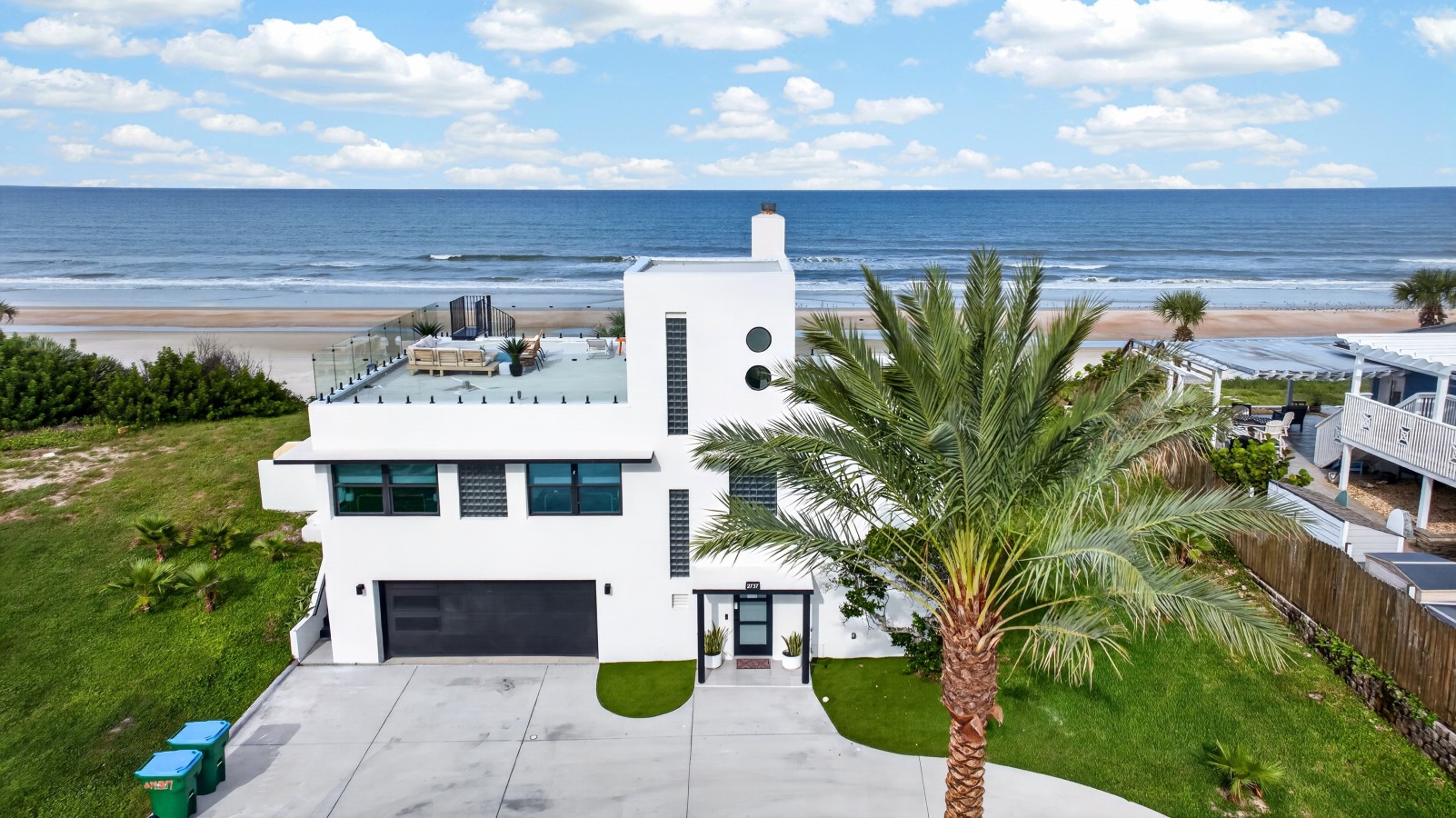 Featured Property Jewel of the Shores Oceanfront Estate | Rooftop Lounge | Game Room
