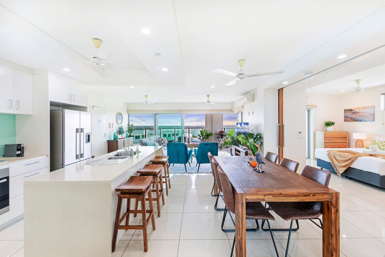 ZEN SEA BREEZE - Darwin's Premier Family Apt - Maximize your living experience with a kitchen that seamlessly connects dining and living spaces for effortless flow