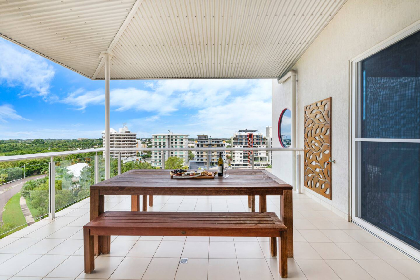 ZEN LUXURY 2-Story Penthouse: Unwind under the sky: Retreat to our covered balcony, where you can savor the outdoors in comfort, rain or shine.