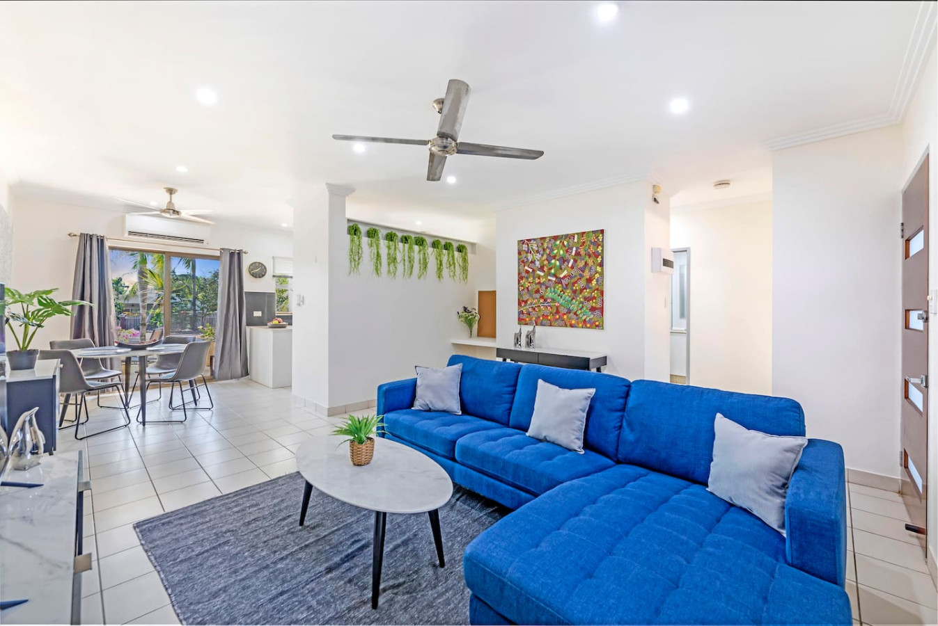 Zen Offshore: Front Porch ~ Lawn ~ Outdoor Dining - Relax in our cozy living room, perfect for unwinding after a long day.