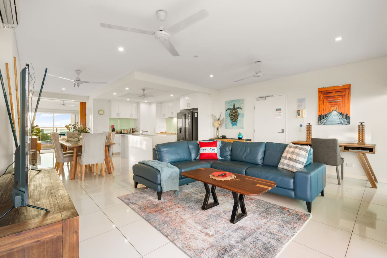 Zen Towers: Executive SeaView Apt in Darwin CBD - "Elevate your living experience in our stylish living room, where the balcony serves as an extension of your personal space with its awe-inspiring views