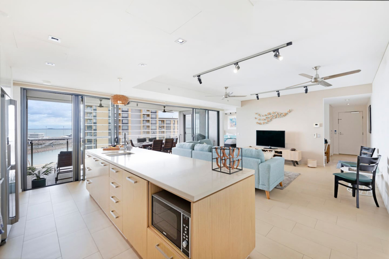 Zen Paradise Seaside Serenity -Prepare meals with a view in our kitchen, where the expansive countertop offers both space and scenery, allowing you to enjoy stunning vistas while you cook and create memories