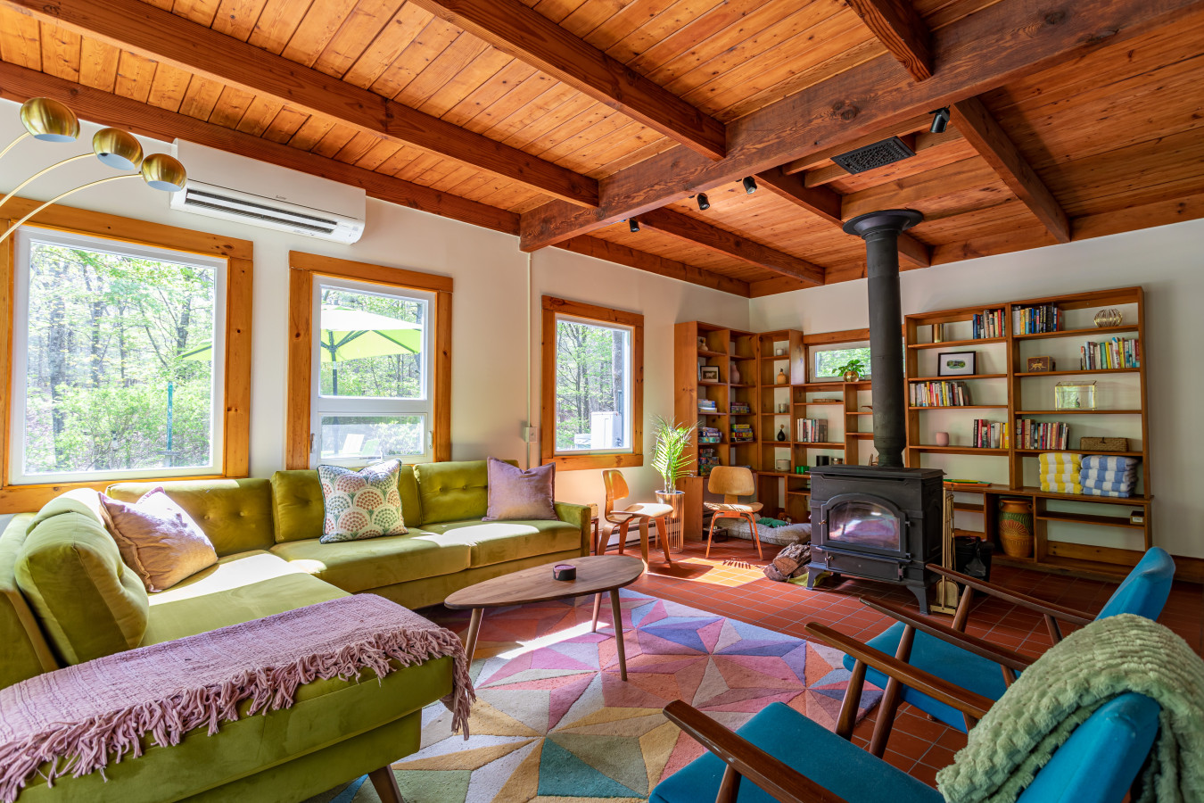 Immerse into the warmth of the wood burning stove and enjoy garden views from every angle
