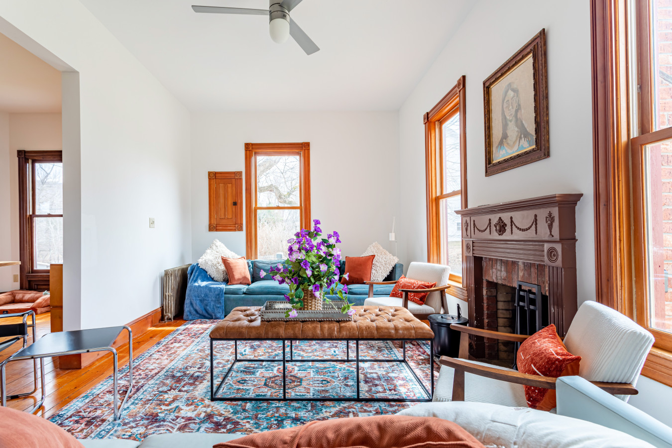 Thoughtfully styled living room with plush seating and vintage touches