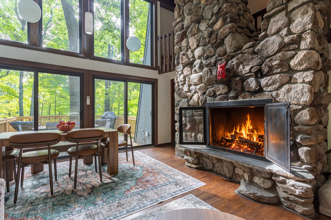 Cozy evenings begin here, with a roaring fire and woodland views