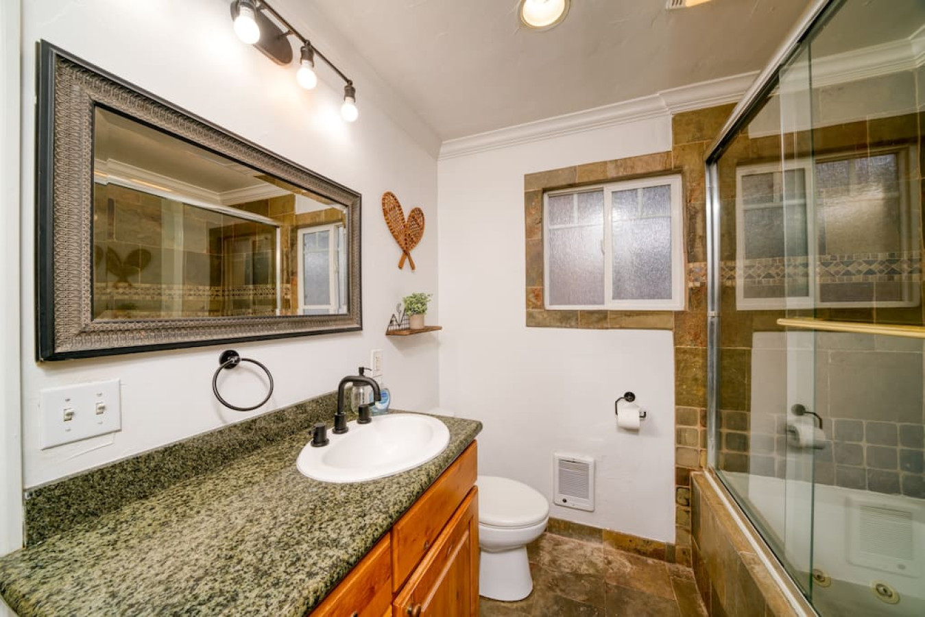 Sink/vanity area, in the bathroom itself.