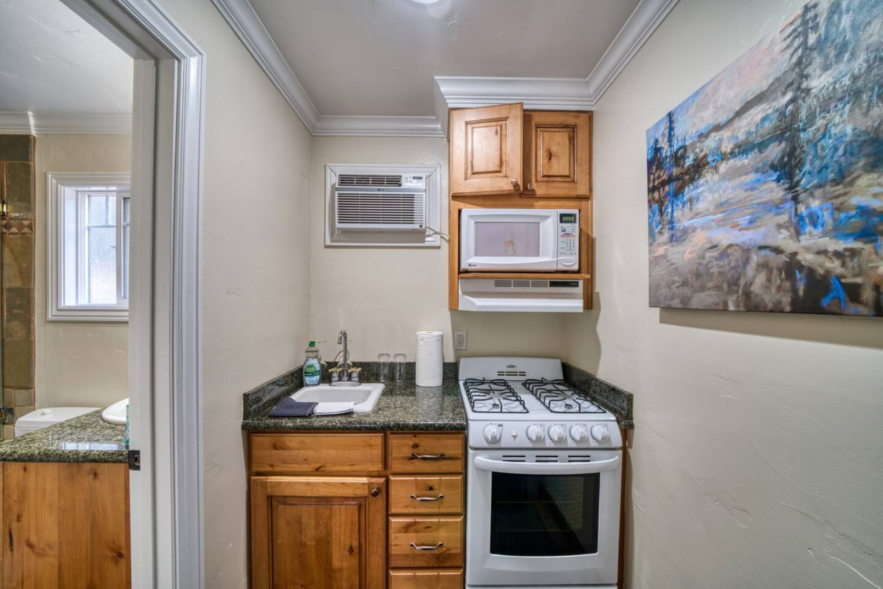 Fully stocked Kitchen across the bathroom