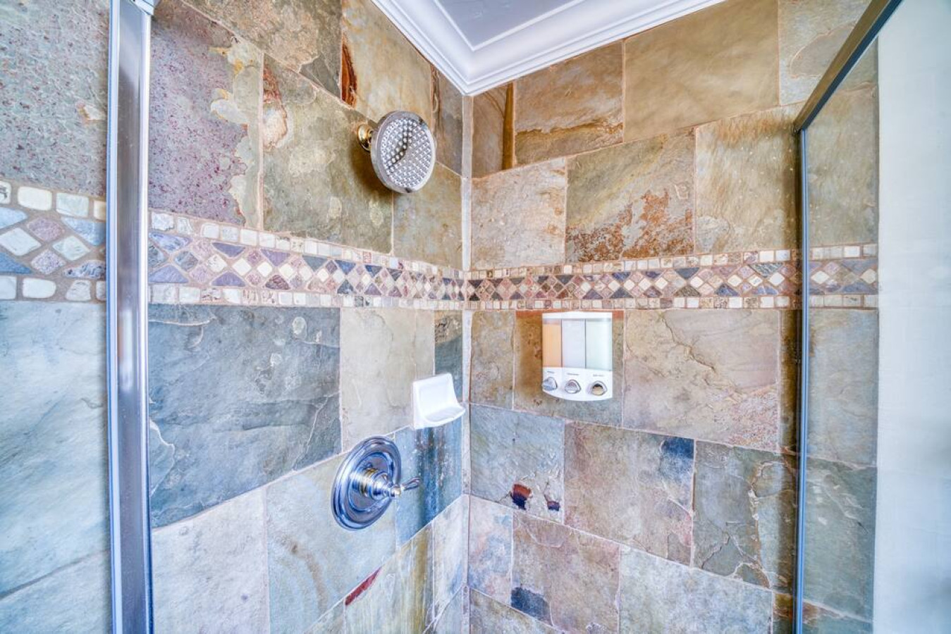 Bathroom with shower gel, shampoo and conditioner