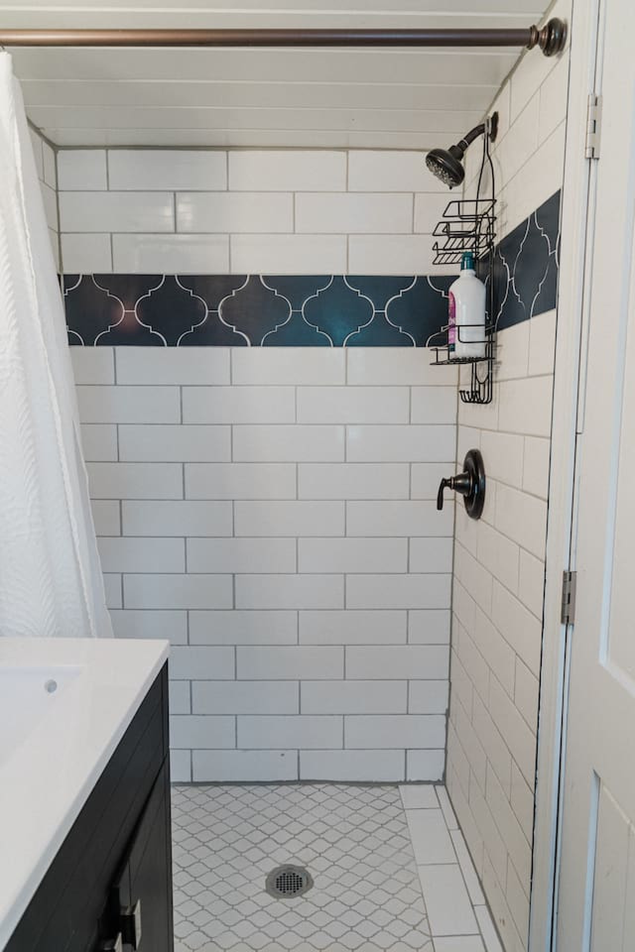 We have a full-sized, tiled shower with a tankless hot water heater!
