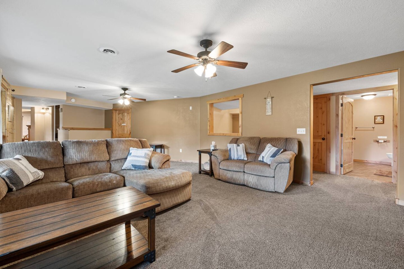 The "Sleeping Nook" wall opening can be seen here above the love seat.