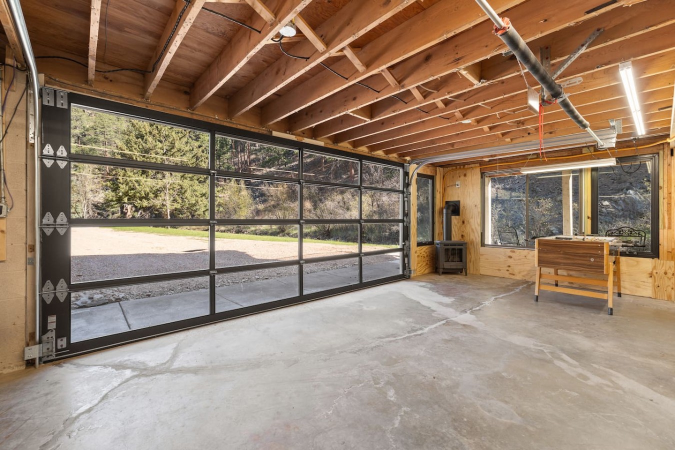 Creekside Retreat | Fireplace + Gameroom — photo 15
