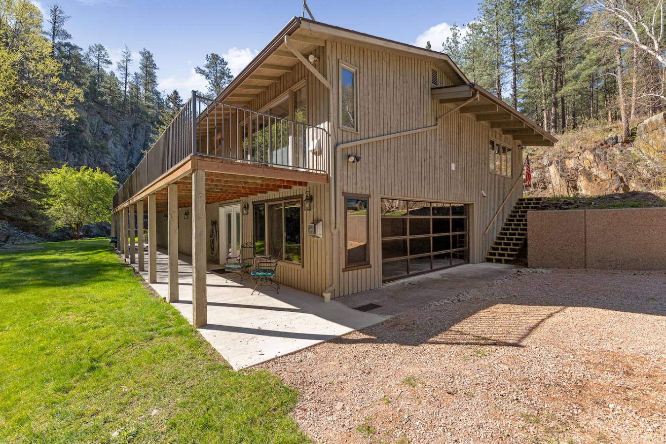 Creekside Retreat | Fireplace + Gameroom — photo 14
