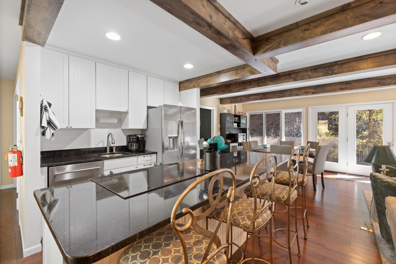 Creekside Retreat | Fireplace + Gameroom — photo 7
