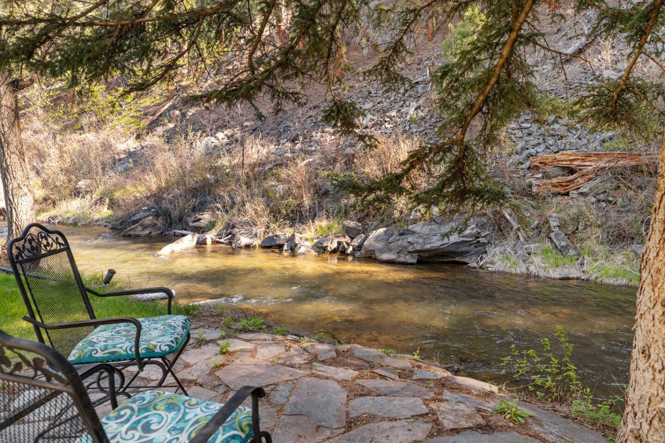 Creekside Retreat | Fireplace + Gameroom — photo 36