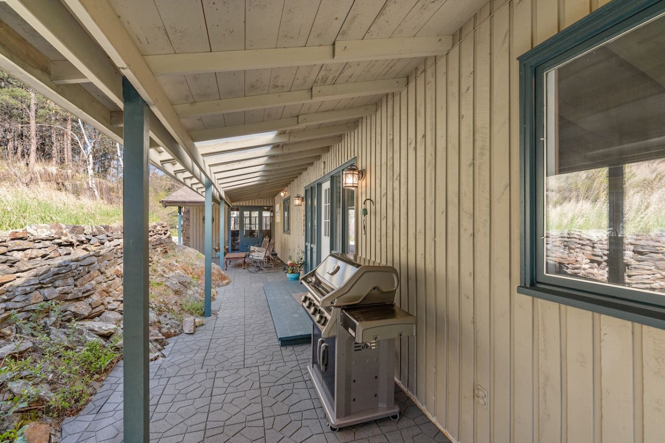 Creekside Retreat | Fireplace + Gameroom — photo 11