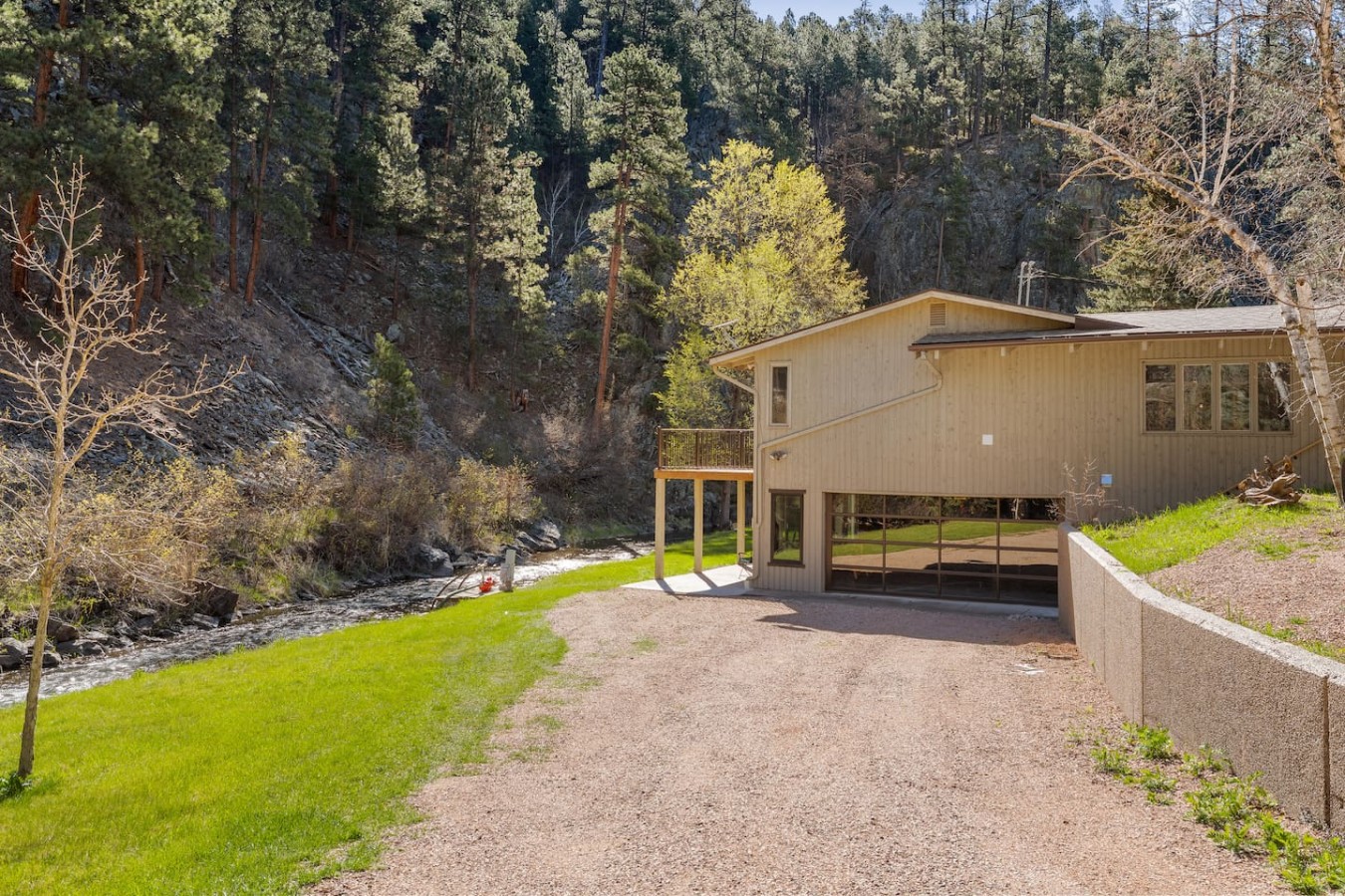 Creekside Retreat | Fireplace + Gameroom — photo 38