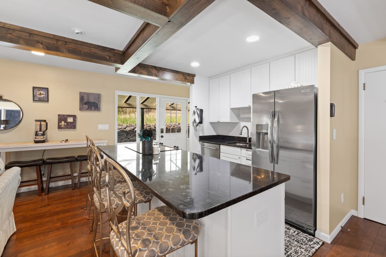 Creekside Retreat | Fireplace + Gameroom — photo 2