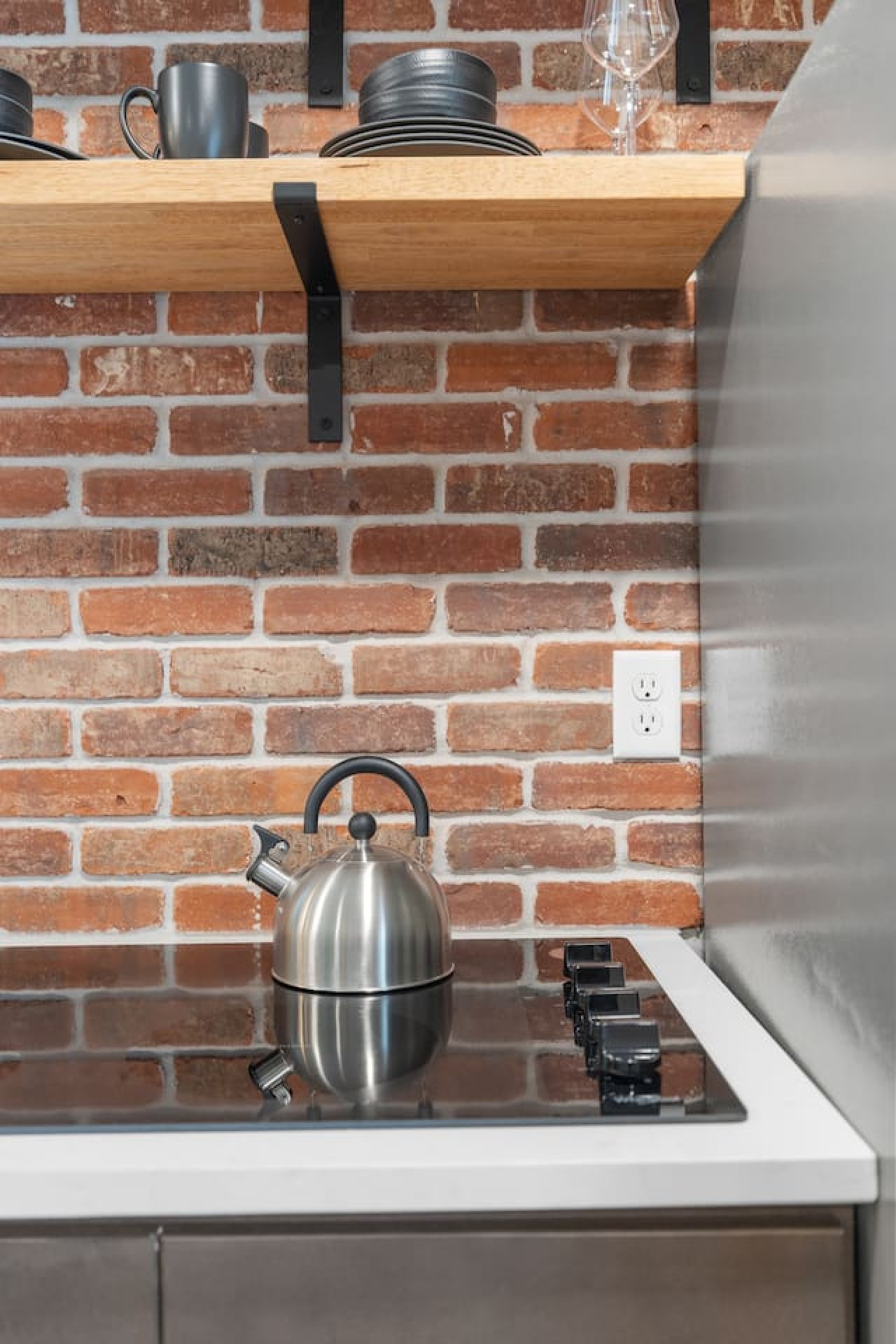 Stylish Studio · King Bed, Brick & Trex Deck — photo 8