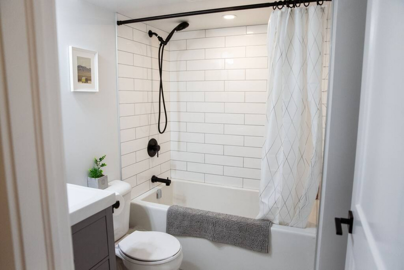 You feel a sense of calm as you enter the bathroom, where the thoughtful design and high-quality materials create a serene environment.