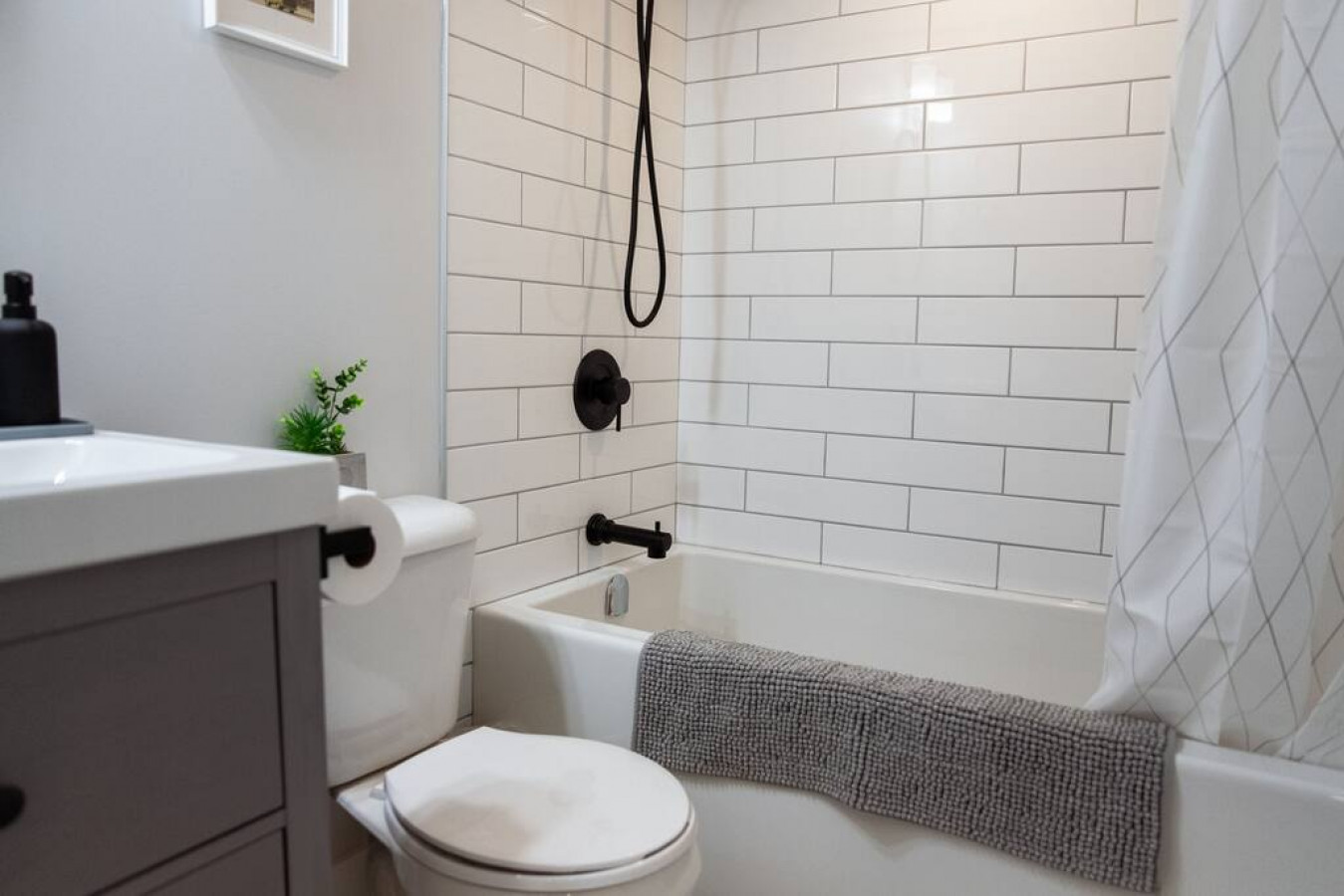 As you step into the bathroom, the clean lines and soothing colors create a space where you can relax and refresh.