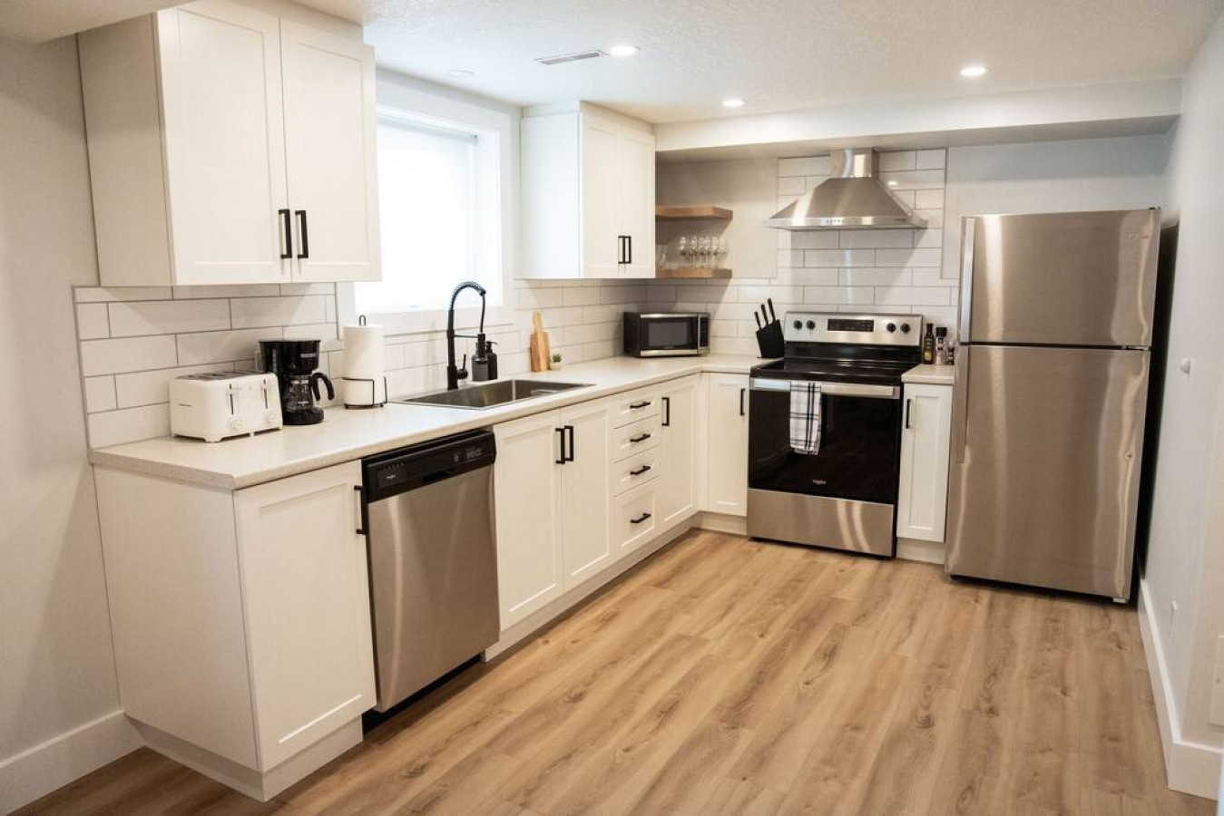 As you step into the kitchen, the clean lines and functional design make you eager to start cooking your favorite dishes.