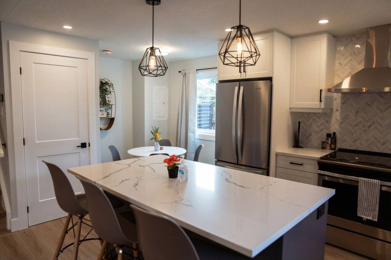 The dining room invites you to savor every moment, whether enjoying a quiet meal or hosting a festive gathering.