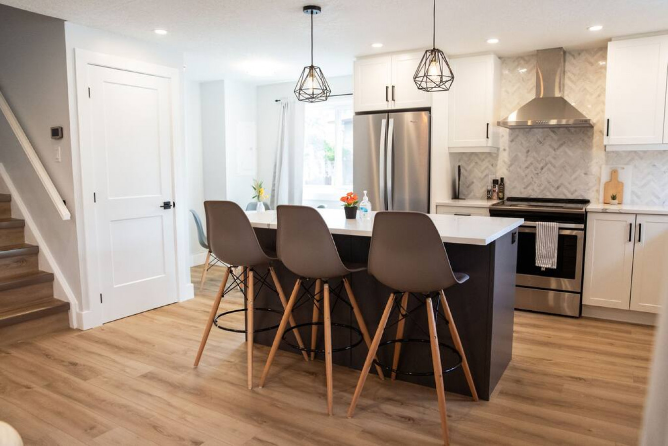 The spacious dining room invites you to savor every moment, whether enjoying a quiet meal or hosting a festive gathering.